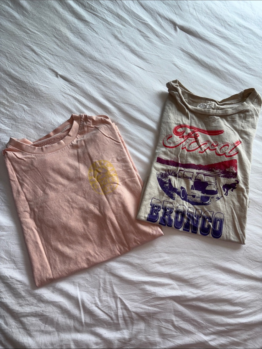 2 T-shirts, Pink American Eagle, and Tan Ford Bronco Cropped Shirt